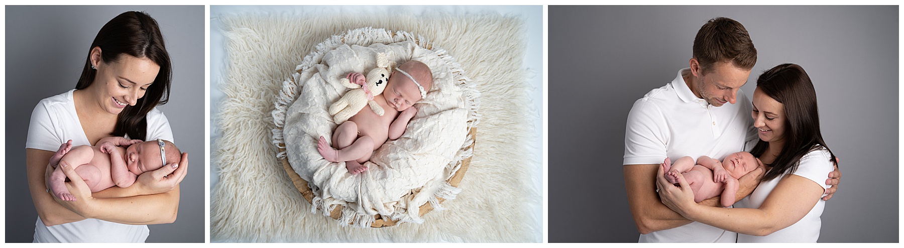Proud new parents looking a newborn baby during a shoot with a Bournemouth newborn photographer